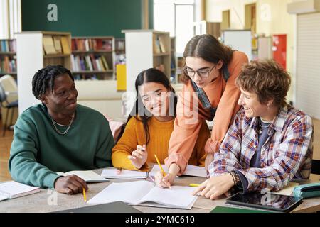 Engaging Group Study Session in Modern Library Stock Photo