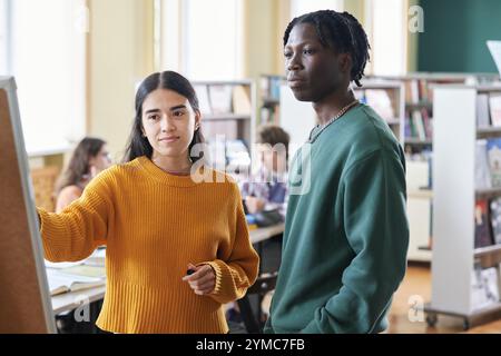 Collaborating on Library Project with Friends and Colleagues Stock Photo