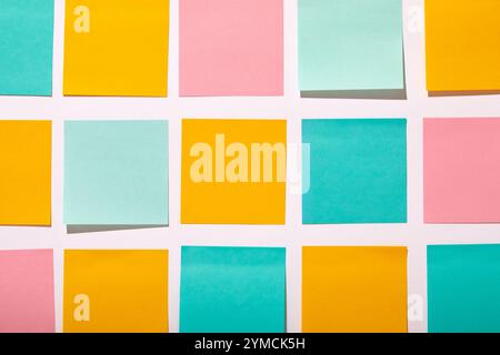 Rows of colorful blank adhesive notes on white background Stock Photo