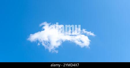 Low angle view of beautiful blue sky with strange shape of clouds in the morning or evening is used as natural background texture in decorative art wo Stock Photo