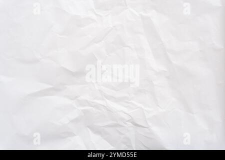 Top view and full frame of wrinkled or crumpled white stencil paper texture is used for wrinkled or crumpled white paper background texture Stock Photo