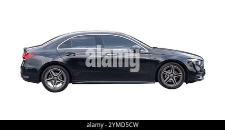 Side view of black sport sedan car is isolated on white background with clipping path. Stock Photo