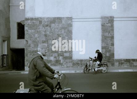 People and their daily life in the streets of Marrakesh in Morocco in the Maghreb in North Africa Stock Photo