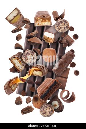 Different chocolate products in air on white background Stock Photo