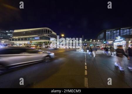 Zoologischer Garten railway station, Primark shop, vehicles and pedestrians with motion blur at Hardenbergplatz at night in Berlin, capital city, inde Stock Photo