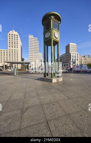 Replica and monument of the first traffic lights and modern office building at Potsdamer Platz in Berlin, capital city, independent city, federal stat Stock Photo