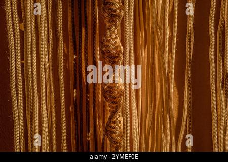 Macrame curtains in the evening light Stock Photo