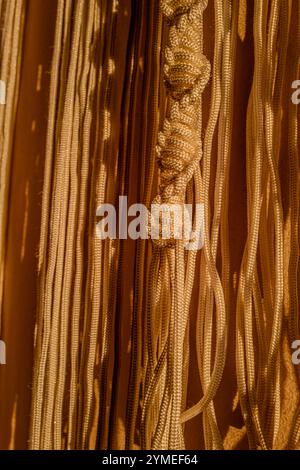 Macrame curtains in the evening light Stock Photo