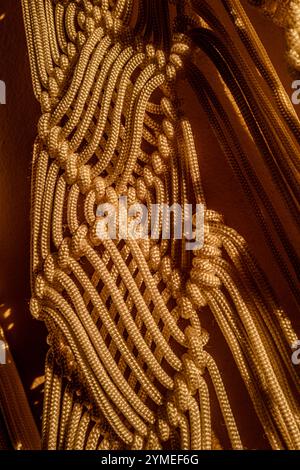 Macrame curtains in the evening light Stock Photo