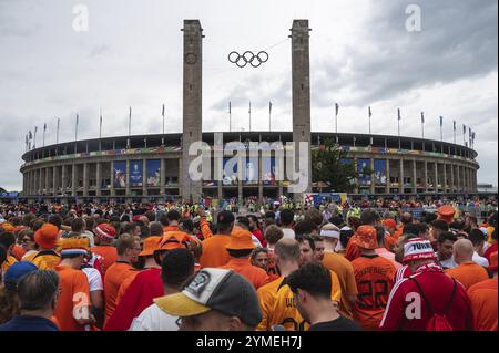 BERLIN, GERMANY - JULY 6, 2024: Euro 2024 quarterfinal match Nederlands vs Turkey (Turkiye) 2:1. Fans in front of the entrance at the Olympiastadion. Stock Photo