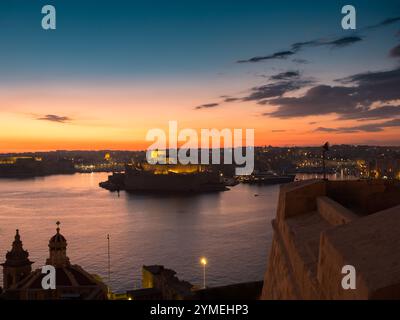 View of the three cities and Grand harbour  at sunset from Valletta, Malta 2024 Stock Photo