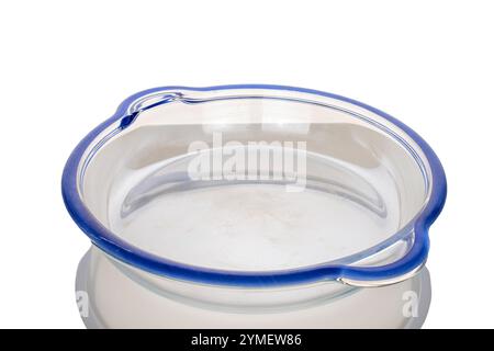 One glass baking dish, close-up, isolated on white background. Stock Photo