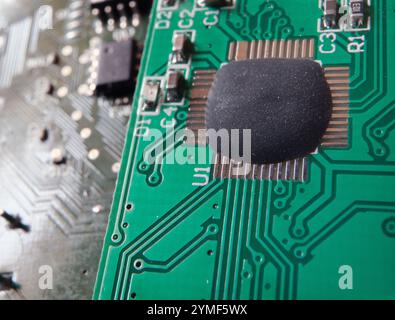 Glob top electronic metarials on the circuit board. Chip on board semiconductor component (COB). Stock Photo