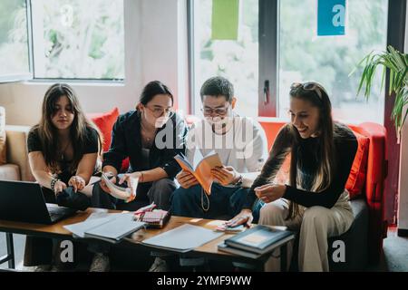 Students collaborating on school projects in a cozy study space Stock Photo