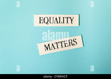 Equality matters is the message of this image. The two white rectangles are written in black and are placed on a blue background. The message is clear Stock Photo