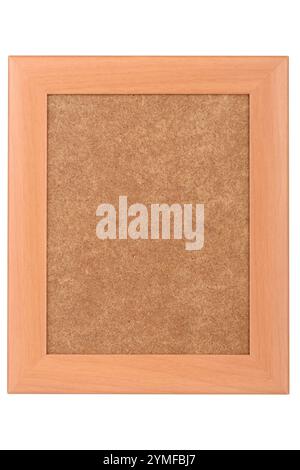 Vertical wooden photo frame with pressed cardboard backing on white background. Copy space. Stock Photo