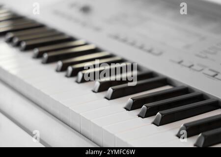 Modern synthesizer in room, closeup Stock Photo