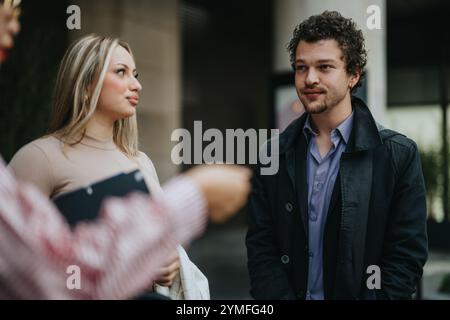 Two business professionals having a conversation outdoors Stock Photo