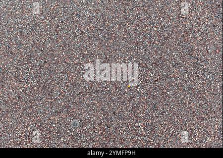 Fragment of the surface of an asphalt footpath. For use as abstract backgrounds and textures. Stock Photo