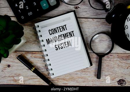 Content Management System (CMS) text on notepad, Business and Financial concept background Stock Photo