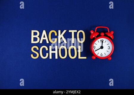 Back to School alphabet letters with gears element on navy blue background Stock Photo