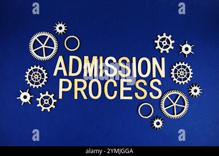 Admission Process alphabet letters with gears element on navy blue background Stock Photo