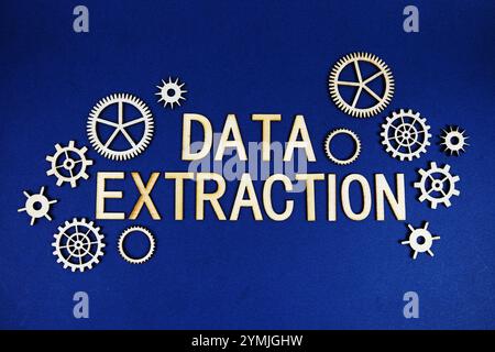 Data Extraction alphabet letters with gears element on navy blue background Stock Photo