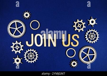 Join Us alphabet letters with gears element on navy blue background Stock Photo