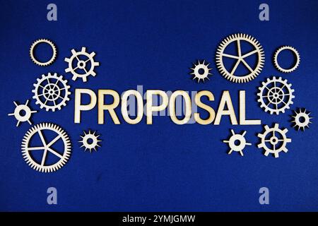 Proposal alphabet letters with gears element on navy blue background Stock Photo