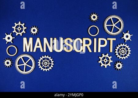 Manuscript alphabet letters with gears element on navy blue background Stock Photo