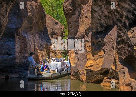 Boat cruise through the stunning sandstone rock formations of Cobbold Gorge in outback Queensland, Australia. Stock Photo