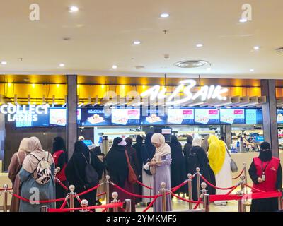 Mecca, Saudi Arabia, June 23 2024: Al Baik, AlBaik is a Saudi fast food restaurant chain headquartered in Jeddah, Saudi Arabia that primarily sells br Stock Photo