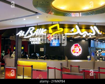 Mecca, Saudi Arabia, June 23 2024: Al Baik, AlBaik is a Saudi fast food restaurant chain headquartered in Jeddah, Saudi Arabia that primarily sells br Stock Photo