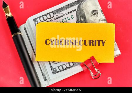 The concept of technology and development. Phrase, words, text CYBERSECURITY on a yellow sticker folded in half. Stock Photo