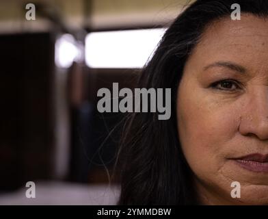 Close-up of mature senior woman with thoughtful expression at home, copy space. contemplation, indoors, holiday, tradition, autumn, seasonal Stock Photo