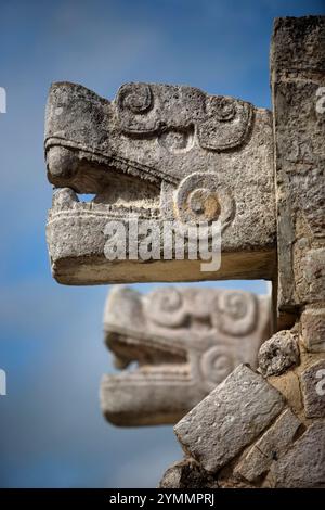 Sculptures of snake heads in the Mayan ruins of Chichen Itza in Yucatan state in Mexico's Yucatan peninsula Stock Photo