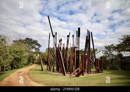 Brumadinho, Brazil. 20th July, 2023. The artwork 'Beam Drop Inhotim' (2008) by American sculptor and performer Chris Burden, in Inhotim. Inhotim Institute is a private Brazilian institution founded in 2004 by Bernardo Paz, a businessman working in the mining sector. The 1,000-hectare site is both a major museum for contemporary art and a botanical garden. 23 pavilions and galleries are open to the public, showcasing the work of some one hundred contemporary artists from over thirty countries. (Photo by Apolline Guillerot-Malick/SOPA Images/Sipa USA) Credit: Sipa USA/Alamy Live News Stock Photo