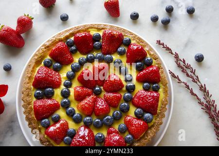 fruits decoration for pastry cake isolated on grey marble Stock Photo