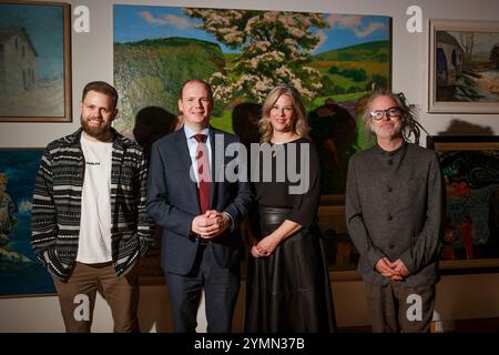 (left to right) Chris Bateman, Communities Minister Gordon Lyons, Anne ...