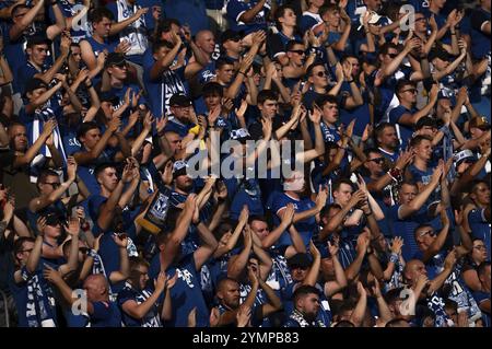 LUBIN, POLAND - AUGUST 17, 2024: Football match Polish PKO Ekstraklasa between KGHM Zaglebie Lubin vs Lech Poznan. Cheering supporters of Lech. Stock Photo