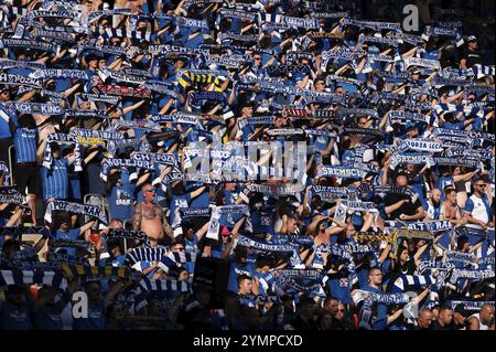 LUBIN, POLAND - AUGUST 17, 2024: Football match Polish PKO Ekstraklasa between KGHM Zaglebie Lubin vs Lech Poznan. Cheering supporters of Lech. Stock Photo