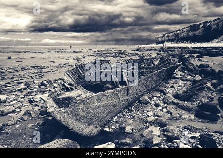 Remains of ship (after shipwreck) at Hunstanton beach, Norfolk, UK. Toned photo. Stock Photo
