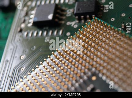 Close up of CPU pins. Microprocessors and semiconductors in electronics. Selected focus. Stock Photo