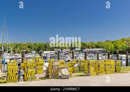 Bright yellow traps on a three mile harbor dock in east hampton Stock Photo