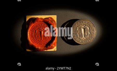 Silver seal and sealing wax imprint (1593).  Seen in National Museum of Iceland (Þjóðminjasafnið), Reykjavík, Iceland. Stock Photo