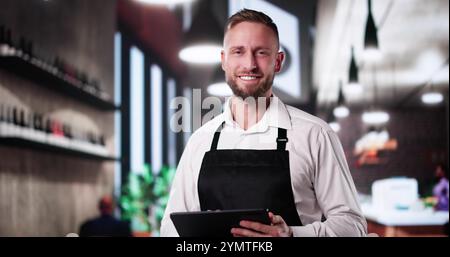 Restaurant Waiter With Tablet. Shop Owner With Vision Stock Photo