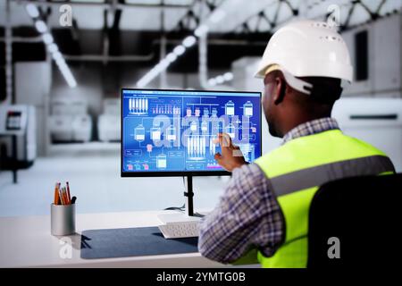 Engineer Operators Using Scada System At Industrial Plant Stock Photo