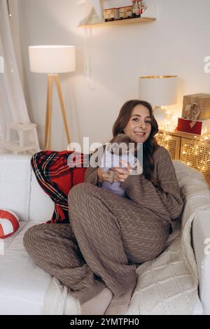 Woman Enjoying Cozy Moments with Stock Photo