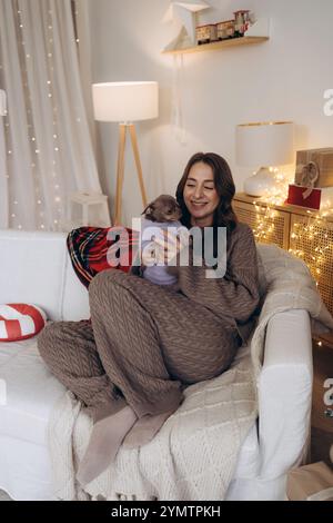 Woman Enjoying Cozy Moments with Stock Photo