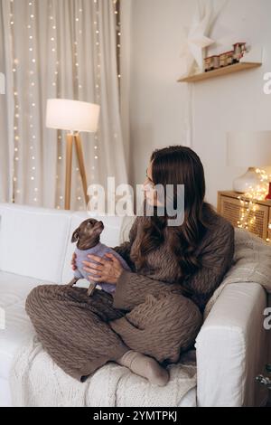 Woman Enjoying Cozy Moments with Stock Photo